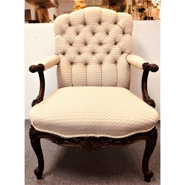 Antique Georgian Style Bergere Armchair. Beautifully carved walnut wood in leaf and floral patterns. Seat apron also has...