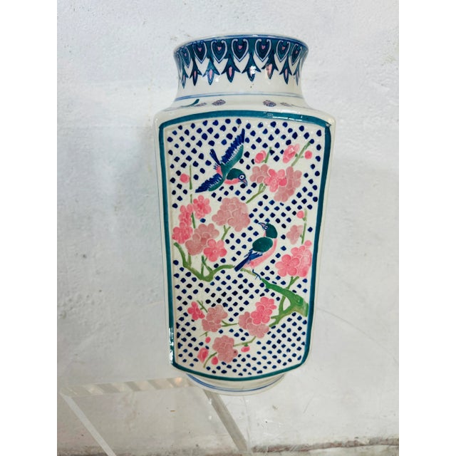 This is a gorgeous vase, chinoiserie print with a slight texture! It’s large scale and great colors!