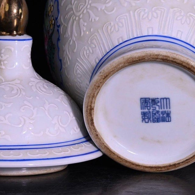 Pair of Chinese White Glazed Porcelain Jars With Floral Panels & Gilt Finials For Sale - Image 9 of 9