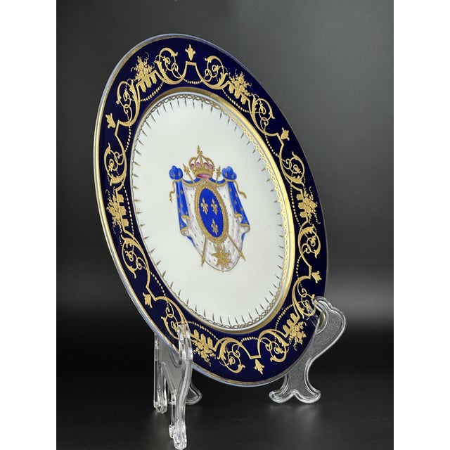 Fine hard-paste porcelain with a perfectly smooth glaze. The cobalt border is adorned with exquisite hand-applied gold...