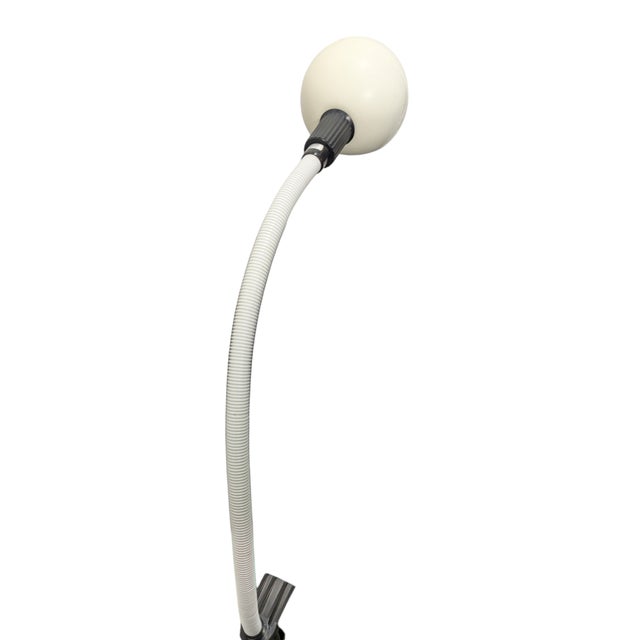 This table lamp is often called snake or cobra in reference to its shape. The piece features a 360-degree rotatable shade...