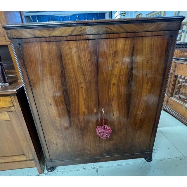 early 20th century cabinet height: 143 cm width: 118 cm depth: 58 cm This piece is attributed to the mentioned...