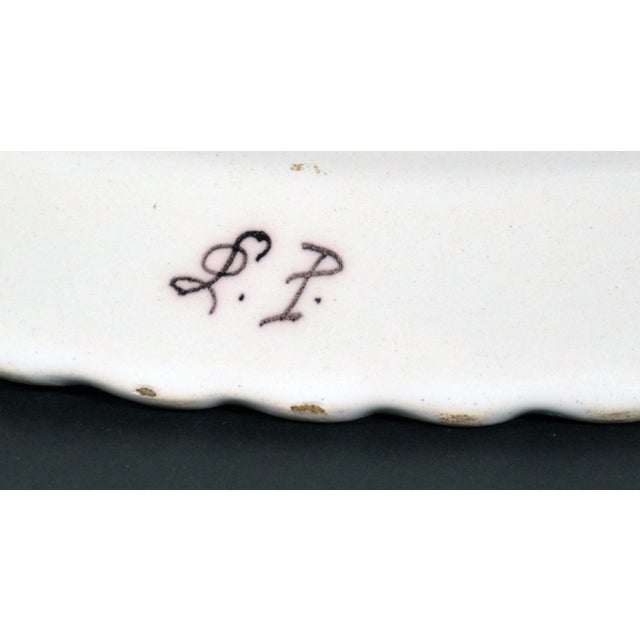 French Faience Shallow Basin Depicting America, After Moustiers, Edme Samson et Cie, Paris, Circa 1885. A massive tin-...