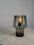 Original Muuto Cosy in Grey table lamp designed by acclaimed Finnish designer Harri Koskinen. The lamp is crafted from...