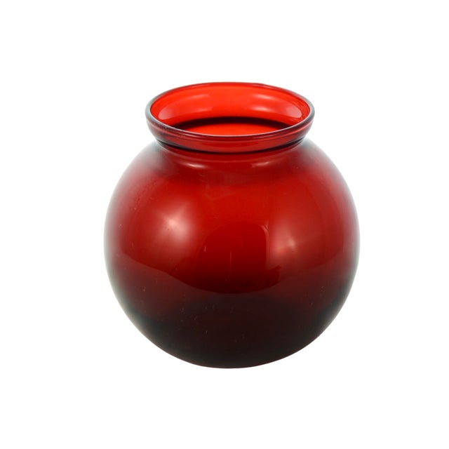 Ruby red four inch vintage glass ball vase or catchall with a slightly flared rim. Simply a beautiful vintage addition to...
