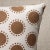 This pillow features Oompa by Studio Bon with a knife edge finish. With graphic offset polka dots encircled by diminutive...