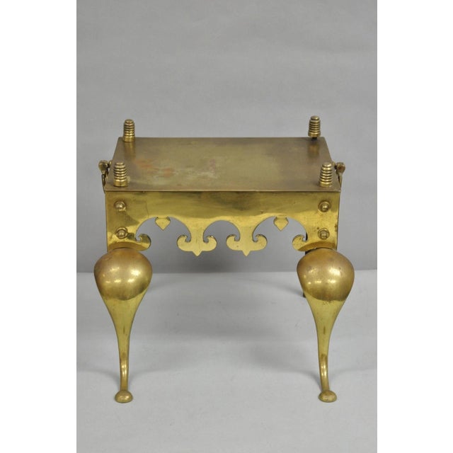 Antique English Victorian Brass Cabriole Leg Fireplace Hearth Footman Trivet. Circa Late 19th Century. Measurements: 15" H...