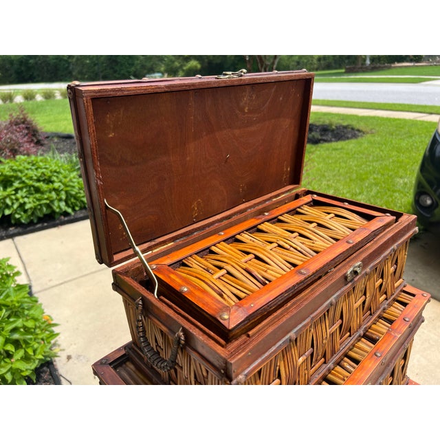 Set of 5 split reed bamboo nesting box crates. Each have woven details across the metals and brass finished closures....