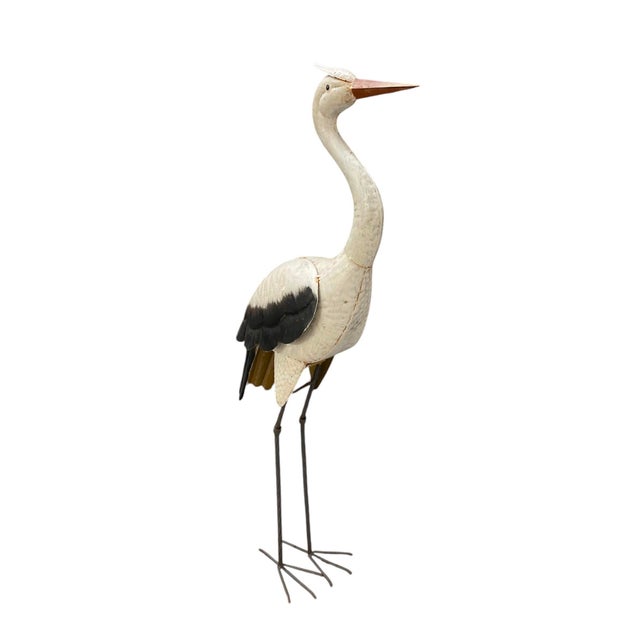 Add a touch of elegant, whimsical charm to your interior or garden space with this vintage stylized crane sculpture....