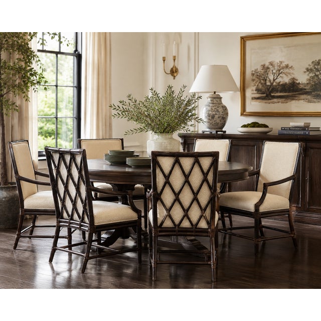 An elegant set of six authentic McGuire San Francisco dining armchairs featuring the company’s iconic diamond lattice...