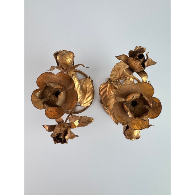 A sweet pair of Florentine rose candle holders for your interior decor. Add a bit of the old world to your living spaces...