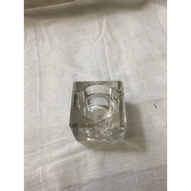 Add a touch of vintage sparkle to your space with this charming mid-century votive candle holder. Carved from solid lead...
