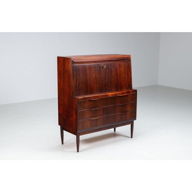 Very nice secretary desk in rosewood design by Erling Torvits and manufactured by Klim Møbelfabrik, Denmark, 1960s. A...
