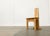 Brutalist children's chair made of wood. The design convinces with its clear lines and its materiality. The individual...