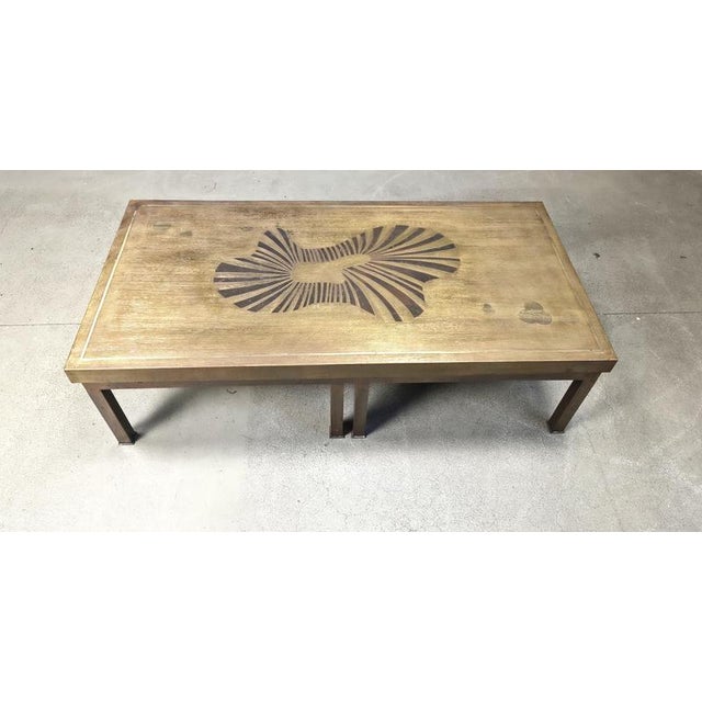 Vintage etched brass coffee table . Eye catching coffee table on a 8 legged brass base. Beautful patina on the brass, good...