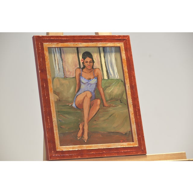 The acrylic portrait of a woman is pleasing and realistic. The frame is also decorative. The artist is briefly signed...