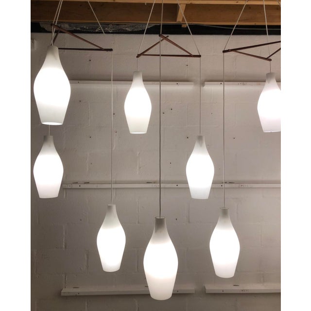 Mid-Century Scandinavian Three-Drop Cascade Opaline Cased Glass Bowling Pin Lights in Teak, 1960s For Sale - Image 15 of 15