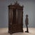 Neobaroque walnut display cabinet from late 19th century Italy, featuring an imposing structure and finely carved details....