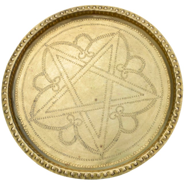 Antique highly crafted, engraved and detailed Moroccan tray. Constructed of solid brass using simple tools, and engraved...