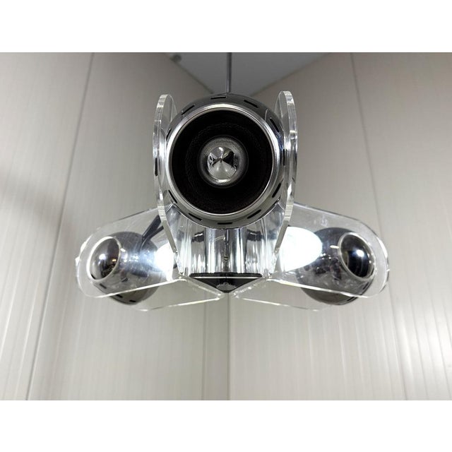 Hanging lamp by Insta GmbH, Germany. Acrylic glass frame with 3 adjustable chrome plated lamp shades. Chrome plated rod...