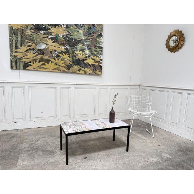 Signed by Roger Capron, a renowned French designer and ceramicist of the 1950s-1970s, this superb ceramic tile coffee...