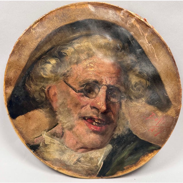 Tondo depicting the portrait of a street performer, painted in three-quarter view on a drumhead, signed in red lower...