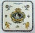 French Faience de Gien trivet or coaster. Vegetal decor with two angel and a bird, in the Italian renaissance style. The...