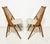 A pair of "Flamingo" spindle chairs designed by Thea Leonard for Nässjö Stolfabrik, Sweden, circa 1950s.