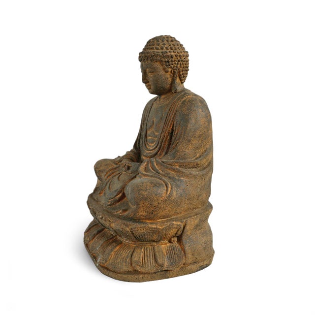 Peaceful cast stone sitting Buddha seated in resting position with beautiful draped robe design. Great focal piece indoors...