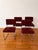 Bauhaus-inspired tubular chrome cantilever design. A striking set of four vintage cantilever dining chairs featuring rich...