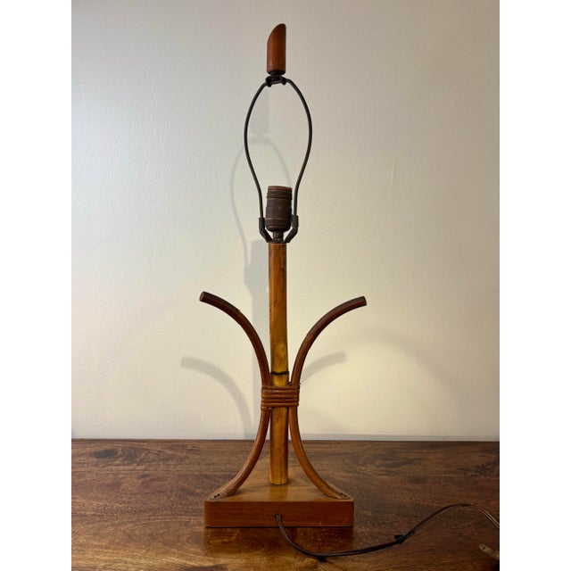 A wonderfully sculptural vintage bamboo table lamp dating to the 1940s or 1950s. Crafted from warm-toned natural bamboo,...