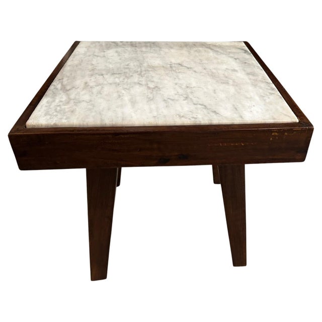 A single slab of marble rests inside a teak wood frame. Please note the sides of the marble have a little wear due to the...