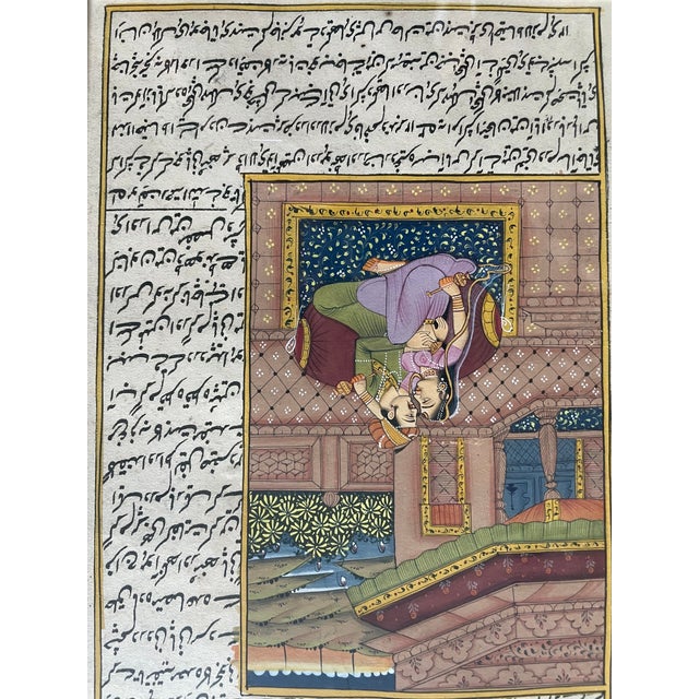 This Mughal Miniature Painting of a King and Queen Love Scene with Tafsir al-Mizan Text is a handmade painting on paper...
