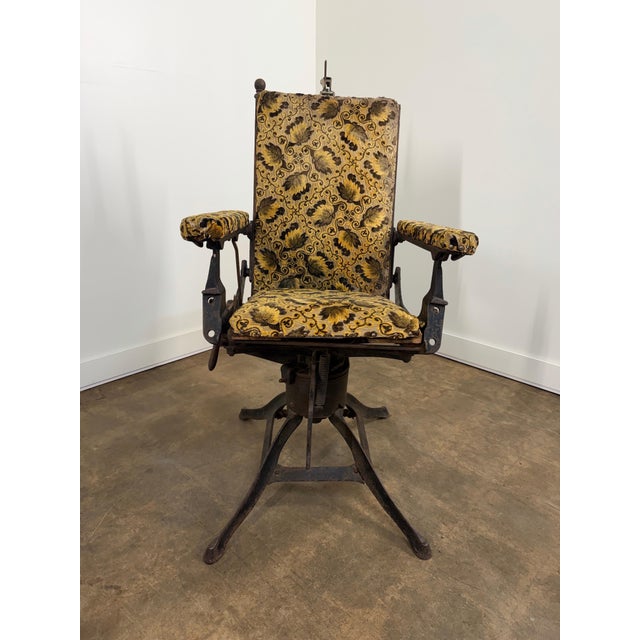 An exceptional and increasingly scarce late 19th to early 20th century American mechanical barber or medical chair,...