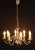 Vintage Low Eight-Arm Chandelier in White Brass For Sale - Image 4 of 4