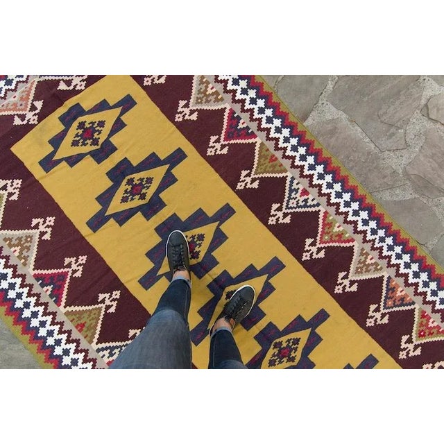 ✂ - - - - - m e a s u r e m e n t s: 5’1” x 9’9”, 155cm x 297.2cm, 10.8 Lbs C O L O R S Base: maroon & mustard yellow...