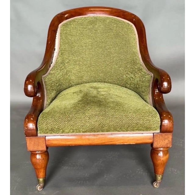 Cozy 19th century upholstered English mahogany library chair. Great color and scale. Fabric ready to use as is or could...