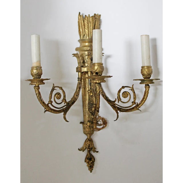 Very fine pair of mid to late 19th century period French yellow bronze wall sconces having three scrolling acanthus leaf...