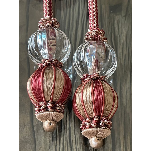 Beautiful vintage pair of silk rope tiebacks with globe lucite tassels.