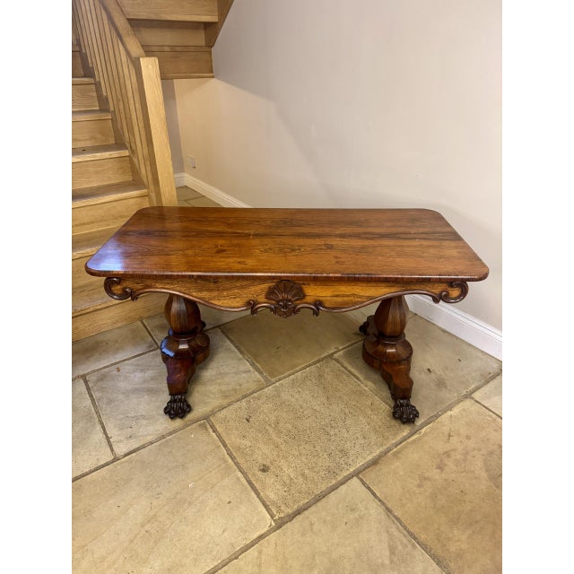 Fine quality antique regency rosewood centre table, having a quality antique rosewood centre table with a quality rosewood...