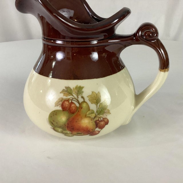 McCoy water pitcher and basin-the were makers of pottery in the early 20th century -very collectible today -especially one...