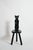 Pair of brutalist ebonised wood owl chairs, 1960s. Zoomorphic brutalist pair of chairs with hinged backrests featuring an...