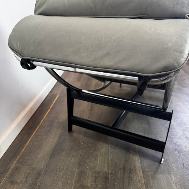 20+ year old classic from Cassina in light grey leather.