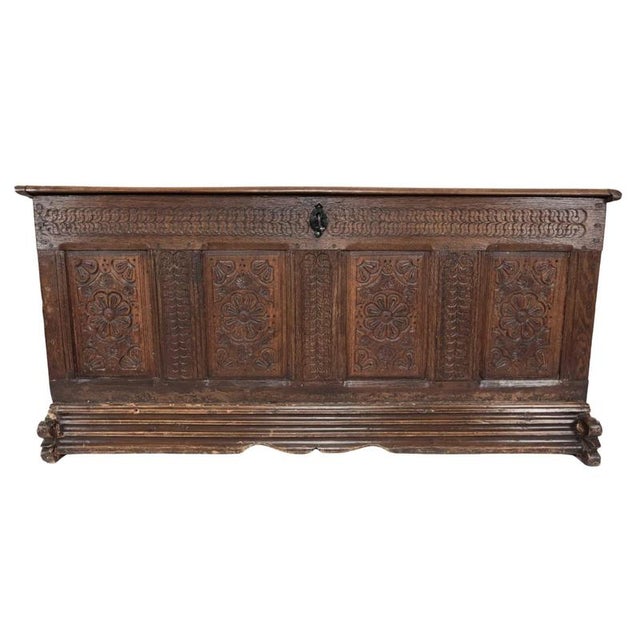 Sturdy chest made of solid oak wood decorated with hand carving. Distinctive plinth with rich profiling. High-quality...