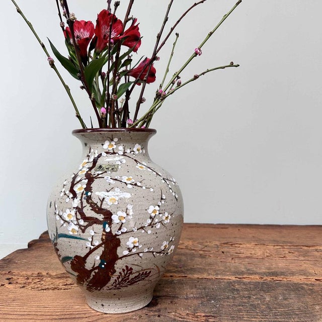 Ceramic ikebana with a lively plum blossom (Ume) decoration, Seiho Kiln. Kotobuki ware (寿焼) is Japanese ceramics produced...