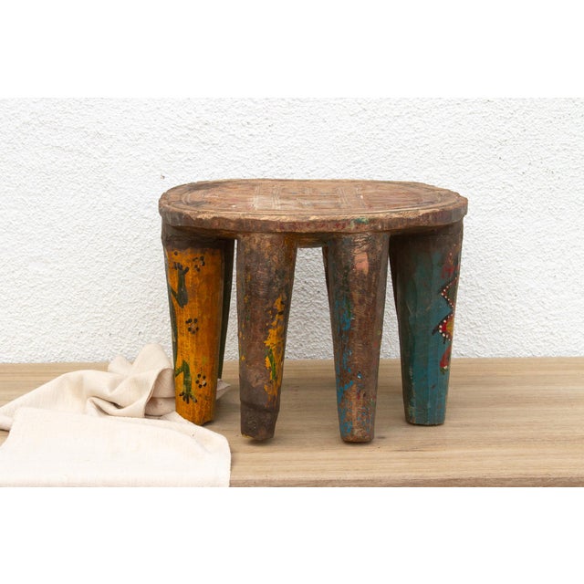 A unique piece of African art, this vintage Nupe table from Nigeria is a must-have for collectors and enthusiasts of Nupe...