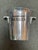 Design Plus Gallery presents a Vintage Champagne Mercier Metal Ice Bucket. The ice bucket has black inset lettering,...