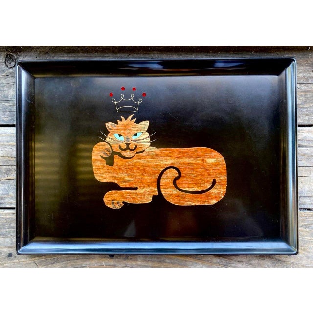 Some designs simply make you smile. This whimsical Mid-Century Modern serving tray by Couroc of Monterey features an...