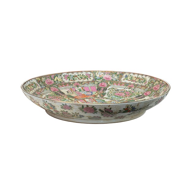 This magnificent large Chinese Famille Rose porcelain charger plate is richly decorated in the classic traditional...