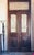 Antique French Painted Double Entry Doors with Transom — Carved Wood and Wrought Iron A grand and character-rich set of...